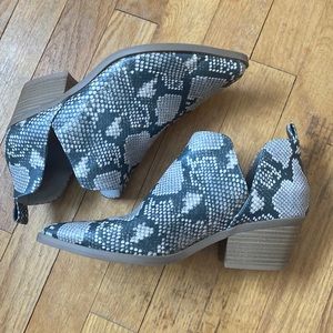 Snake skin heeled boots